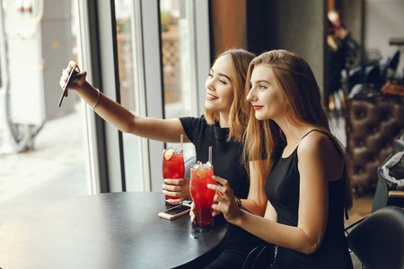 girls with cocktailsの写真素材