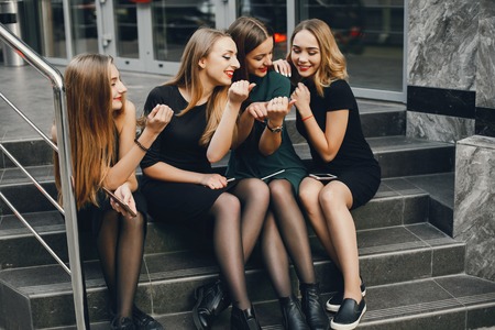 girls with phoneの写真素材