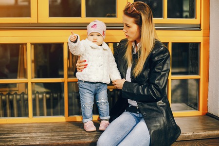 young mother with little daughterの写真素材