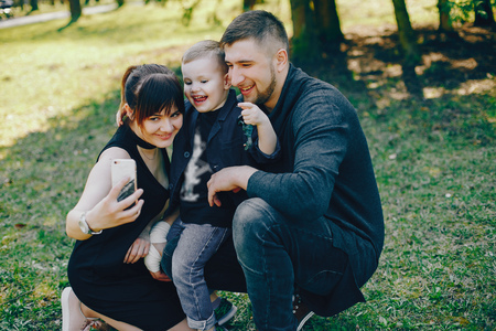 cute family in a parkの写真素材