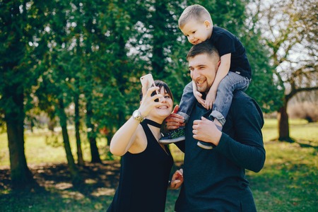 cute family in a parkの写真素材