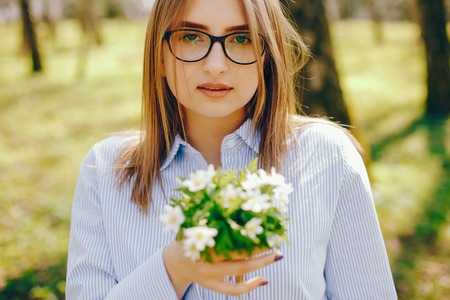 pretty girl in a summer forestの写真素材
