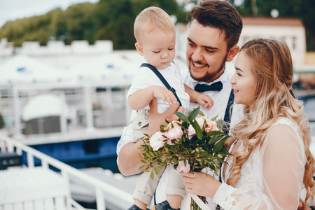 Beautiful family with cute little sonの写真素材