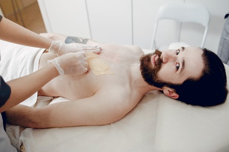 Handsome man in a beauty salonの写真素材