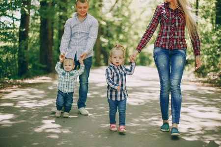 Family in a forestの写真素材