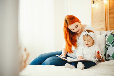 Cute family at homeの写真素材