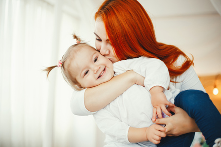 Cute family at homeの写真素材