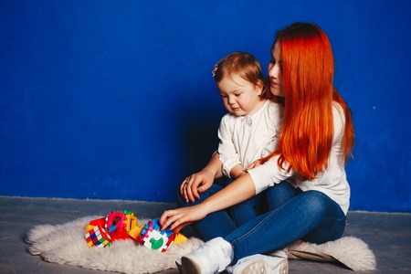 Cute family at homeの写真素材