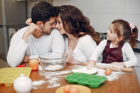 Family cook the dough for cookiesの写真素材