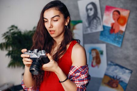 Fashion girl standing in a studioの写真素材
