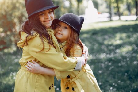 Cute kids plaiyng on a rainy dayの写真素材