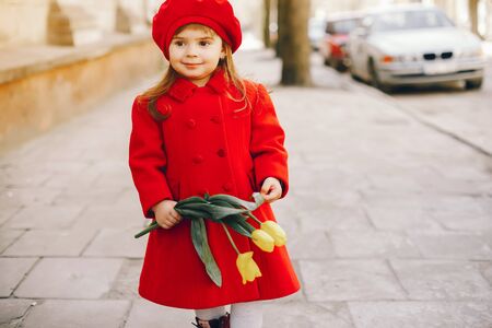 litlle girl with flowersの写真素材