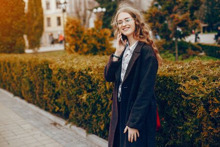 stylish girl in a parkの写真素材