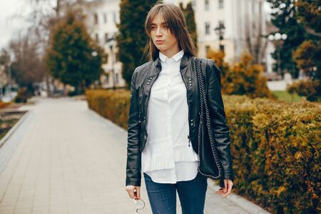stylish girl in a parkの写真素材