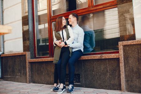 cute couple in a cityの写真素材