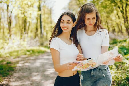 Girls in a forestの写真素材