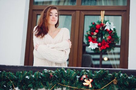 Girls standing on a balconyの写真素材