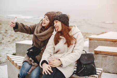 girls and snowの写真素材