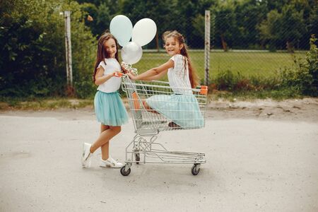 cute girls with ballonsの写真素材