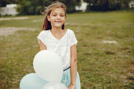 cute girl with ballonsの写真素材