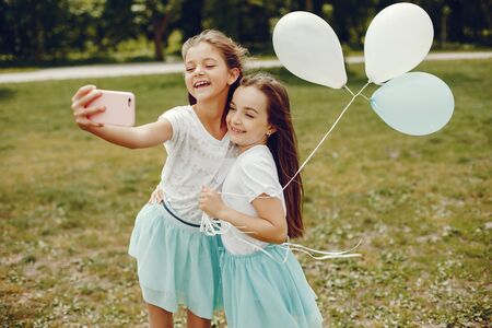cute girls with ballons