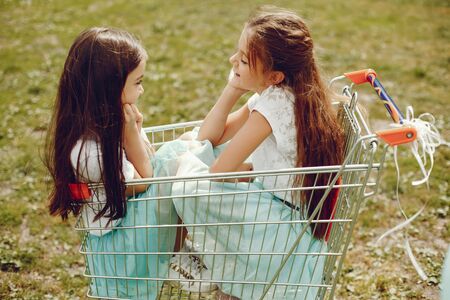 cute girls with cartの写真素材