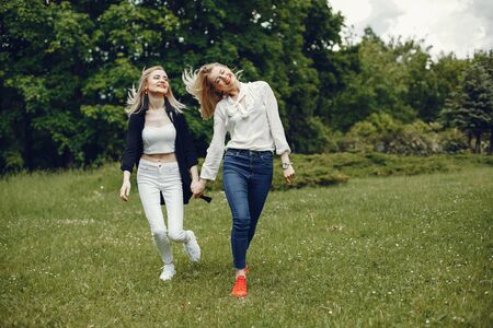 Girls in a parkの写真素材