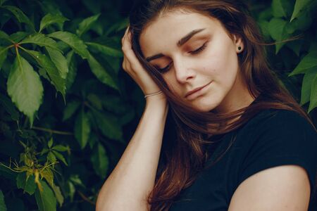 Girl near treeの写真素材