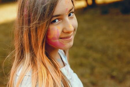 Cute girl have fun in a summer parkの写真素材