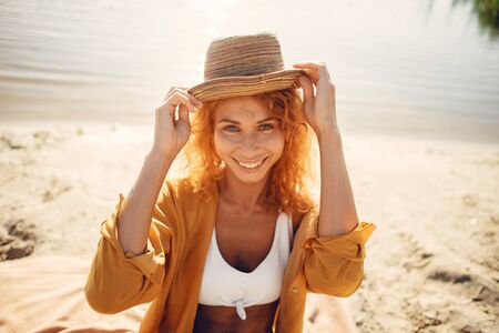 Beautiful and elegant girl on a resortの写真素材