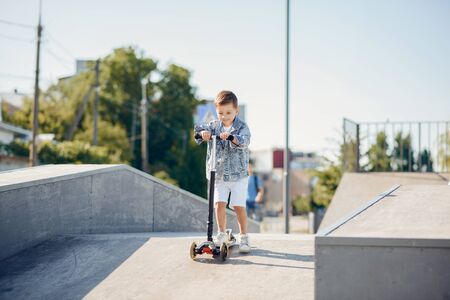 Cute little children playing in a summer park