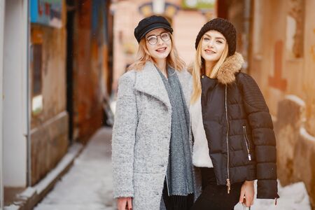 Girl in a winter cityの写真素材