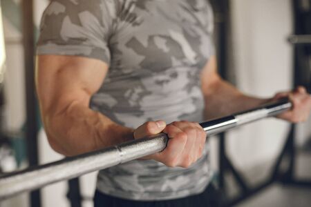 A handsome man is engaged in a gymの写真素材