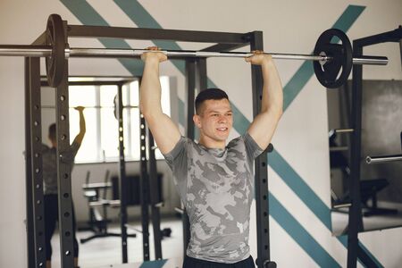 A handsome man is engaged in a gym