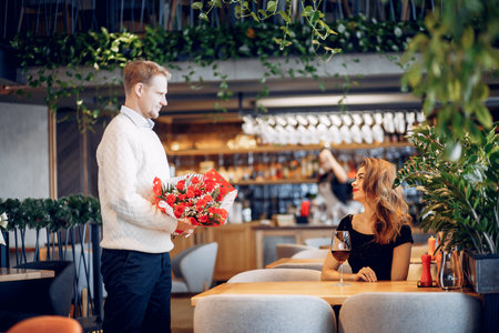 Elegant couple spend time in a restaurantの写真素材