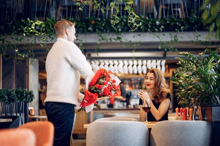 Elegant couple spend time in a restaurantの写真素材