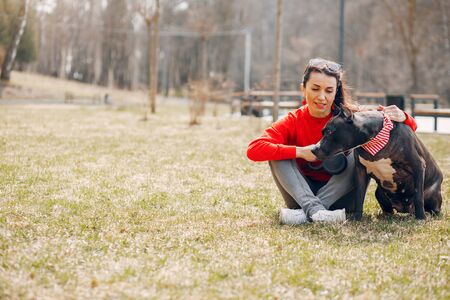 Sports and stylish woman in a spring parkの写真素材