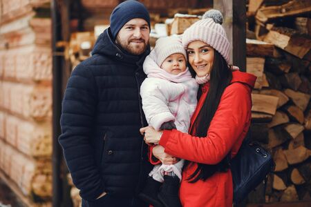 Family in a winter parkの写真素材