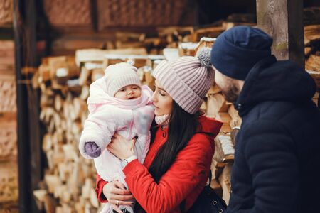 Family in a winter parkの写真素材