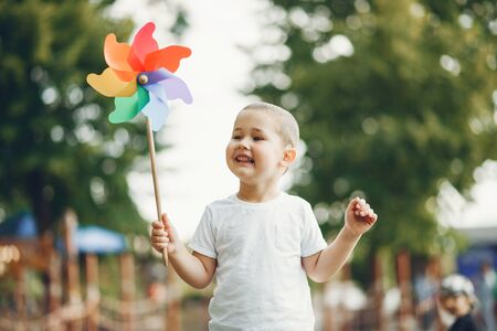Cute little boy have fun on a playgroundの写真素材