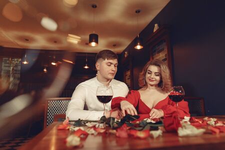 Elegant couple spend time in a restaurantの写真素材