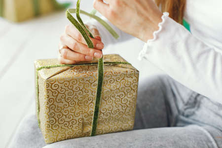 Family sitting at home with presentsの写真素材