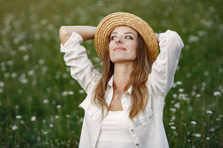 Beautiful woman resting in the park.の写真素材