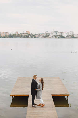 Beautiful couple spend time by the waterの写真素材