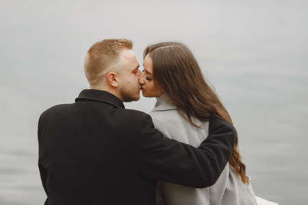 Beautiful couple spend time by the water