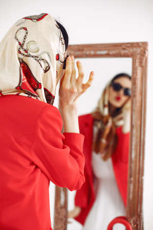 Girl in a fashion image on a white backgroundの写真素材
