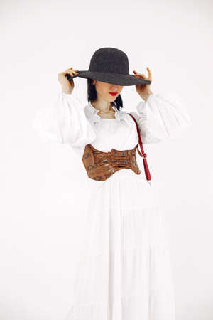 Girl in a fashion image on a white backgroundの写真素材