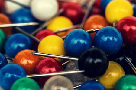 magnified colored pins