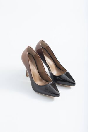Stylish high heel shoes on white backgroundの写真素材