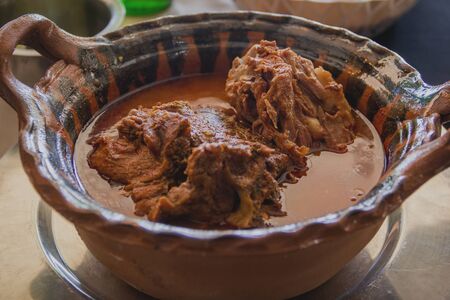 The mole of hips or Huaxmole in clay pot is typical dish of Tehuacan, Pueblaの写真素材